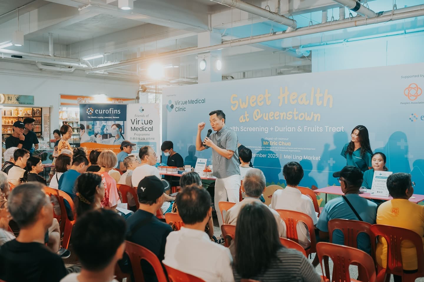 Mr Eric Chua, MP for Tanjong Pagar GRC, speaking with residents at Sweet Health @ Queenstown