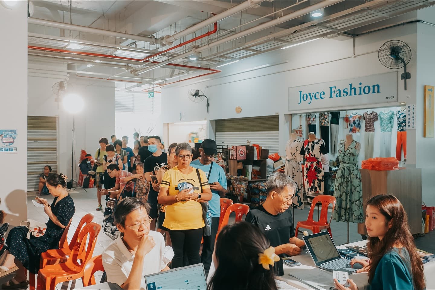 Residents waiting for their blood pressure, blood sugar, and cholesterol screenings