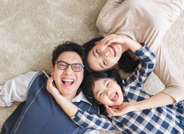 Family (Dad, Mum, Child) Lying on Floor