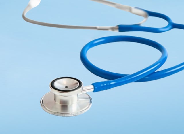 Stethoscope on blue background.jpg
